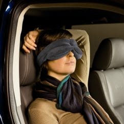 girl sleeping in a car