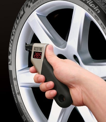 gauging the pressure of a tire