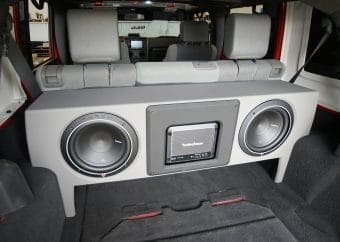 A 10 inch subwoofer installed in a car