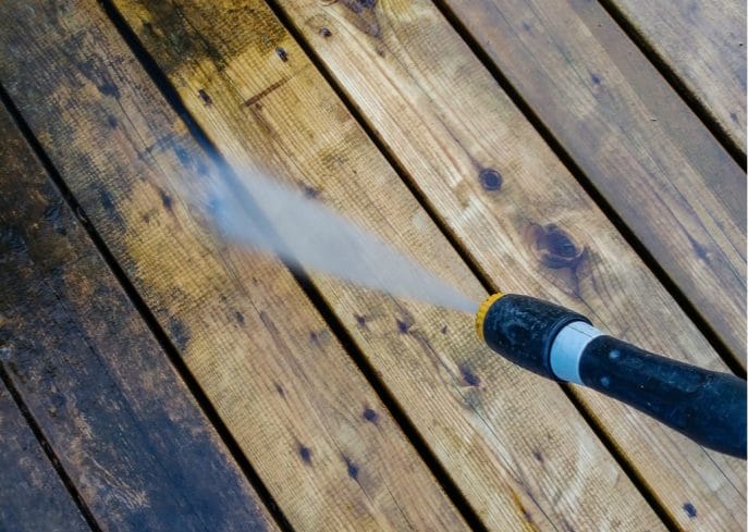 Clean the deck with pressure washer
