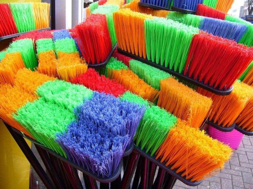 Cleaning Solar Panels with a plastic broom